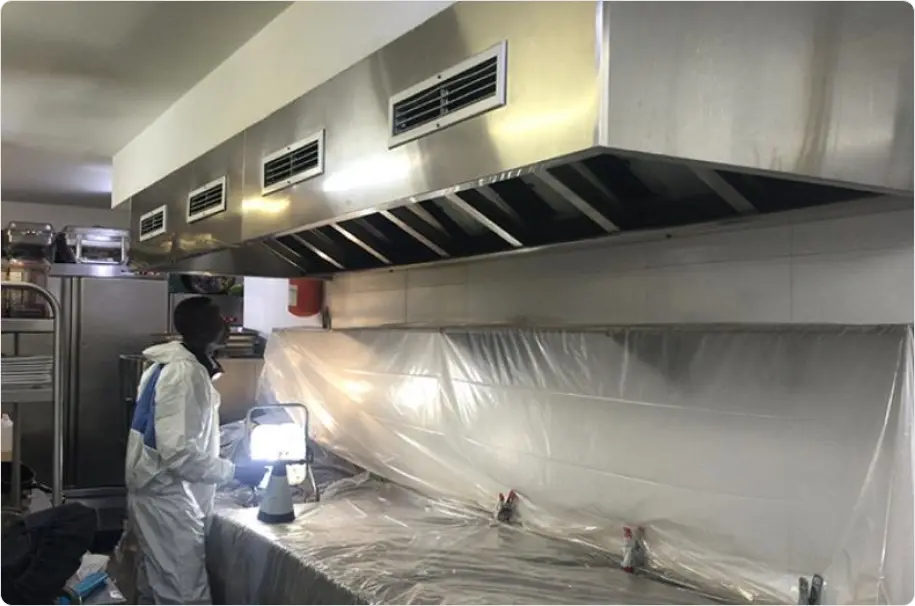 Dubai Municipality-approved kitchen hood cleaning service in progress